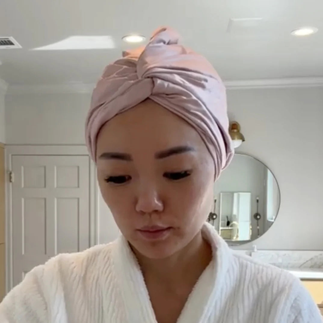 Customer wearing pink silk bonnet